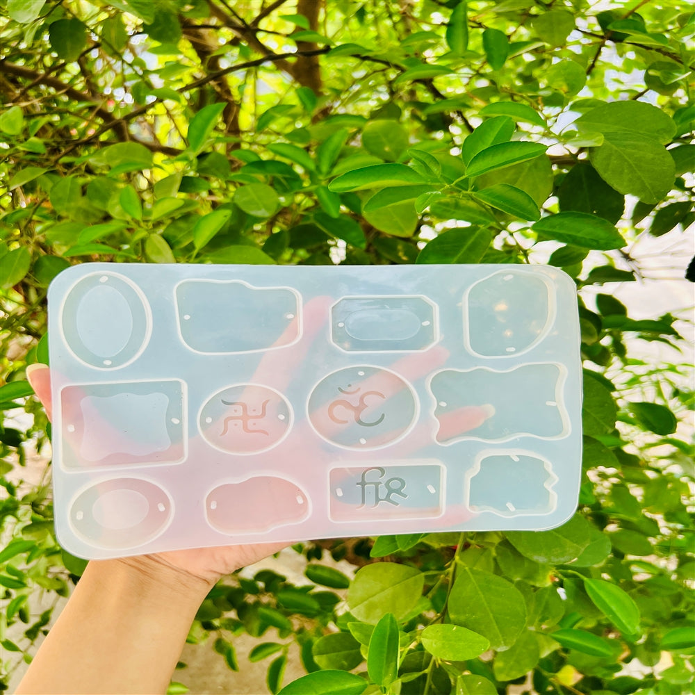 Om Swastik Fusion Rakhi Mould β 14 Cavities